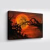 Gallery‑wrap haunted landscape canvas with dark silhouettes and fiery sky